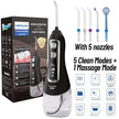 Black water flosser with packaging and nozzles on a white background