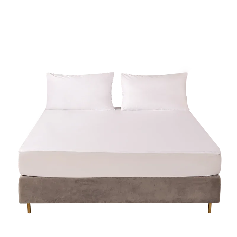 Mattress protector on a bed with two pillows on a white background