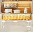 Kitchen cabinet with telescopic shelves containing kitchenware on a wooden background