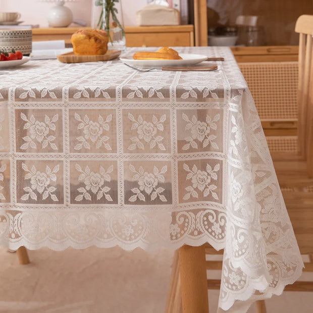 Tablecloth with floral lace design on a dining table