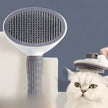 Pet shower head with a cat looking at it on a neutral background