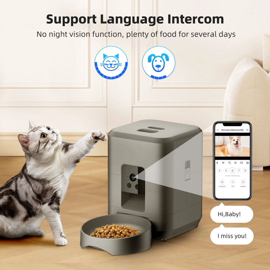 Pet feeder with a cat reaching for food, smartphone app interface, and text about language intercom and food supply.