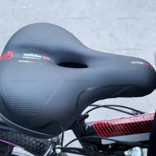 Close-up of a bicycle saddle with 'Active' branding on a blurred background