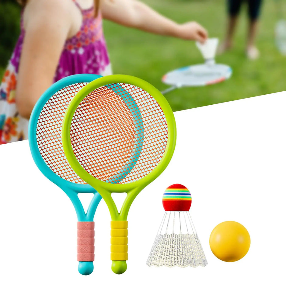 Colorful badminton racket set with a shuttlecock and yellow ball on a white surface.