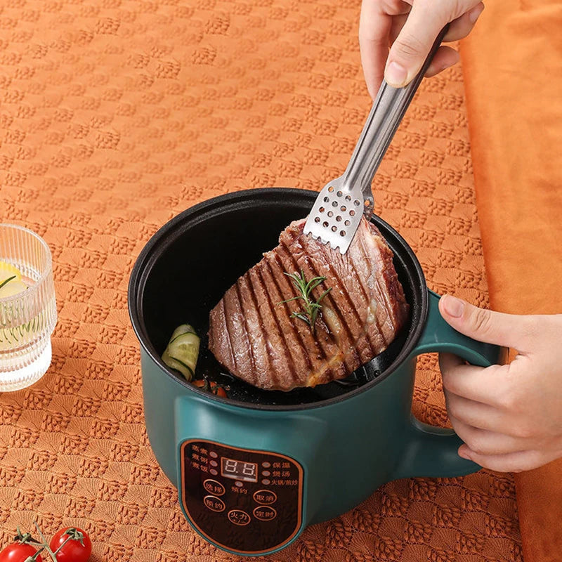 Person cooking steak in a portable grill on an orange textured surface