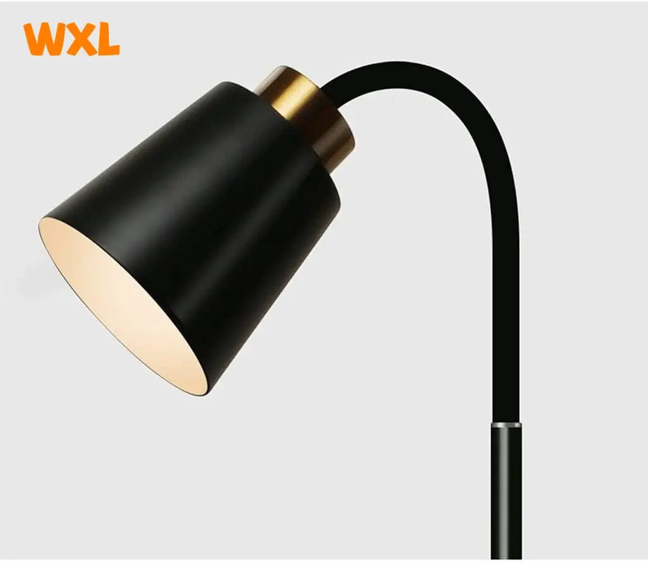 Black and gold floor lamp with WXL branding on a light gray background