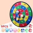 Colorful dartboard game with darts on a beige background