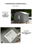 Gray ceramic pet house with text on a white background