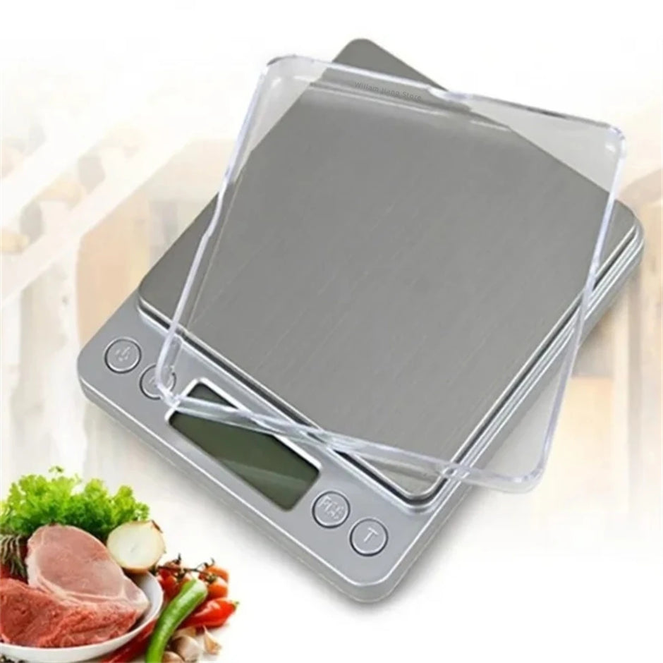 Digital kitchen scale with transparent lid on a white background
