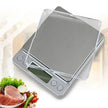 Digital kitchen scale with transparent lid on a white background