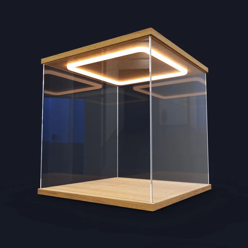 Wooden display case with glass sides and a square light fixture on a black background