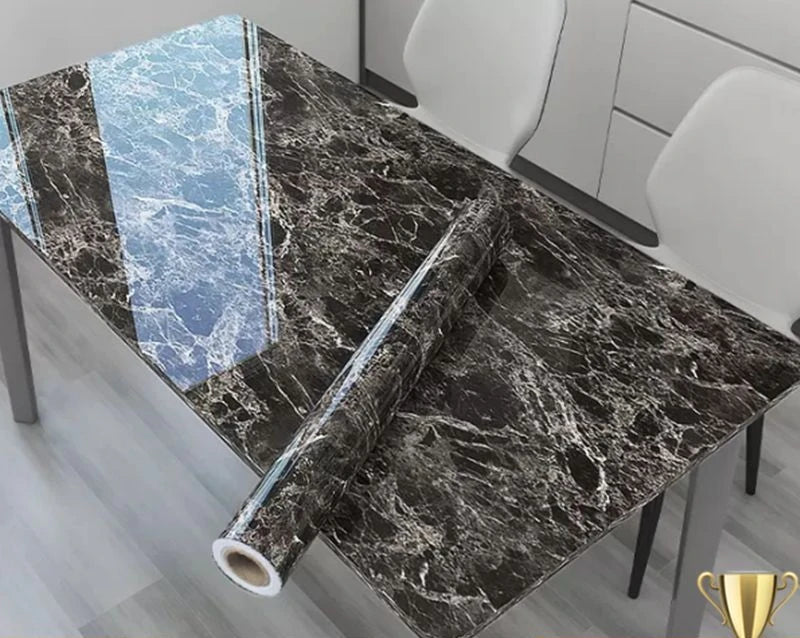 Marble-patterned table cover roll on a dining table with chairs in the background