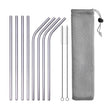 Set of metal straws with cleaning brush and mesh carrying case on a white background
