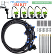 Garden irrigation system kit with hose, nozzles, and connectors on a white background