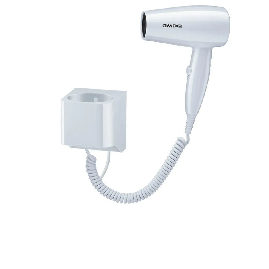 White hair dryer with coiled cord attached to a wall socket on a white background