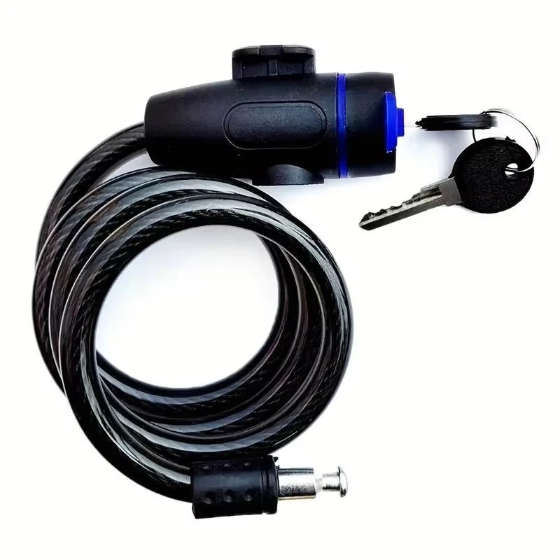 Coiled bike lock with key on a white background