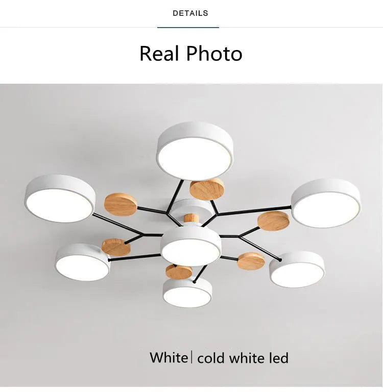 Modern ceiling light fixture with wooden accents on a plain background