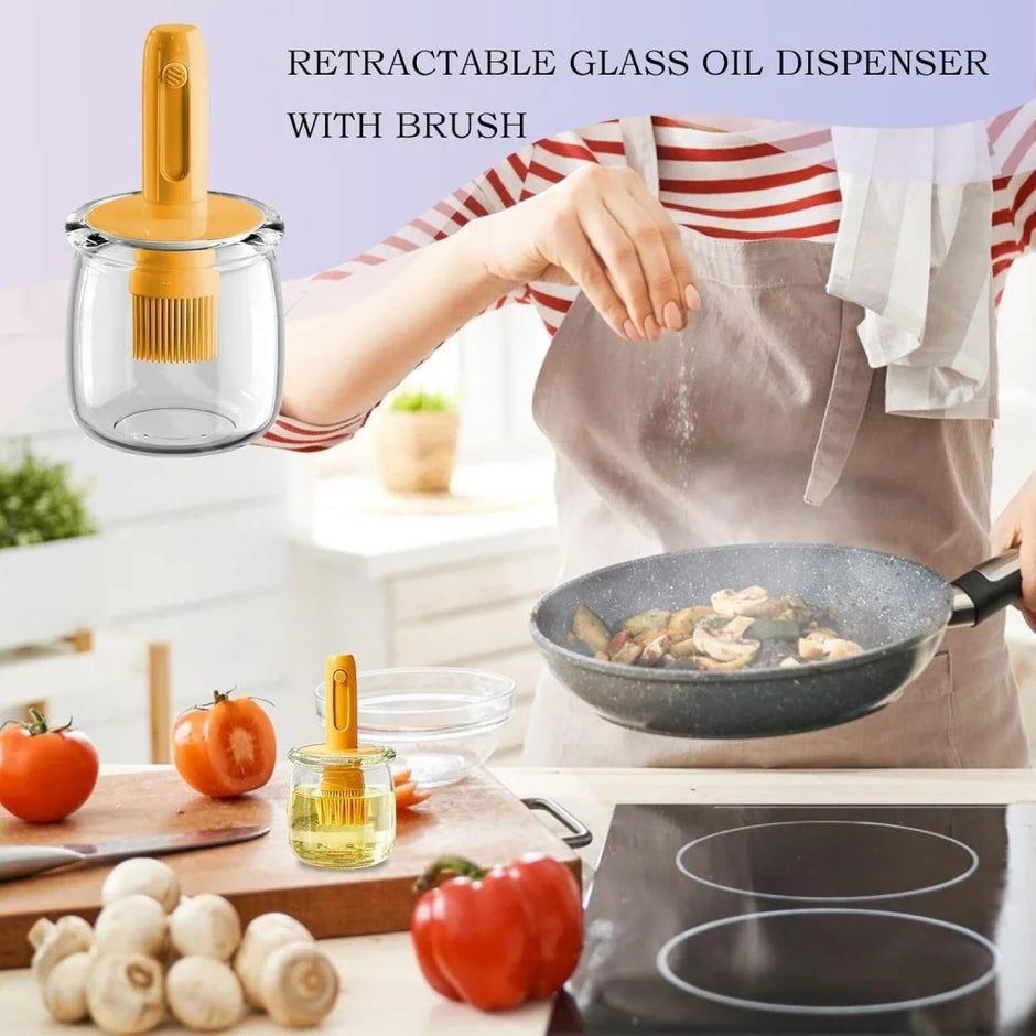 Retractable glass oil dispenser with brush in a kitchen setting