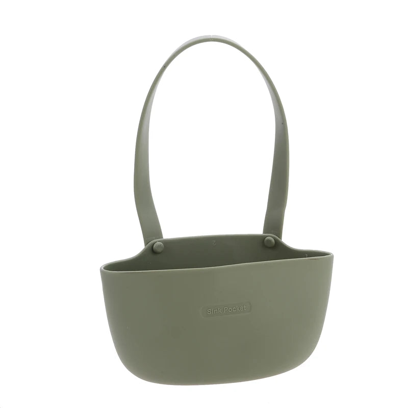 Green hanging planter with a handle on a white background