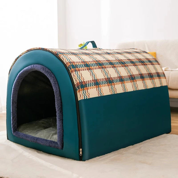 Pet bed with plaid cover on a wooden floor