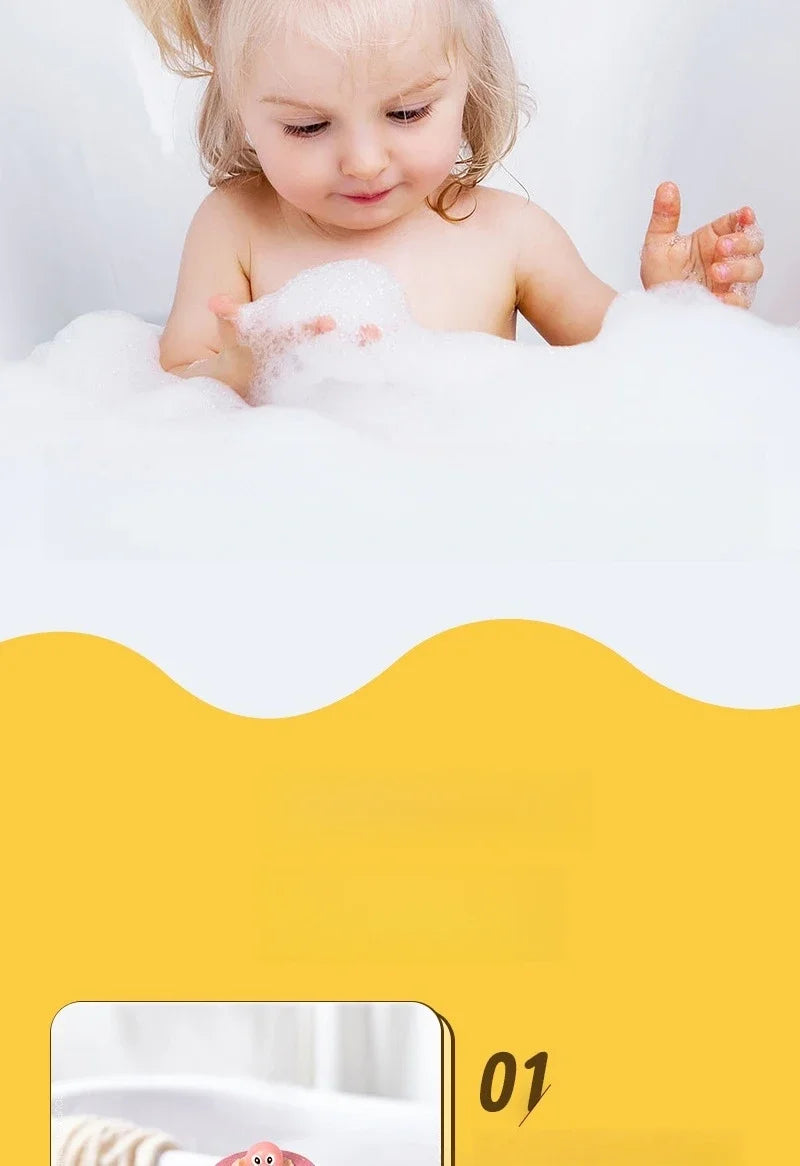 Child playing with bubbles in a bathtub with a yellow wave design at the bottom.