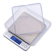 Digital kitchen scale with clear lid on a white background