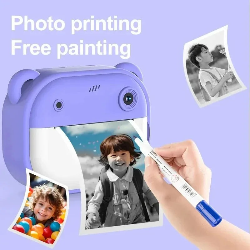 Purple photo printing and free painting device with printed photos and a hand holding a marker on a purple background.