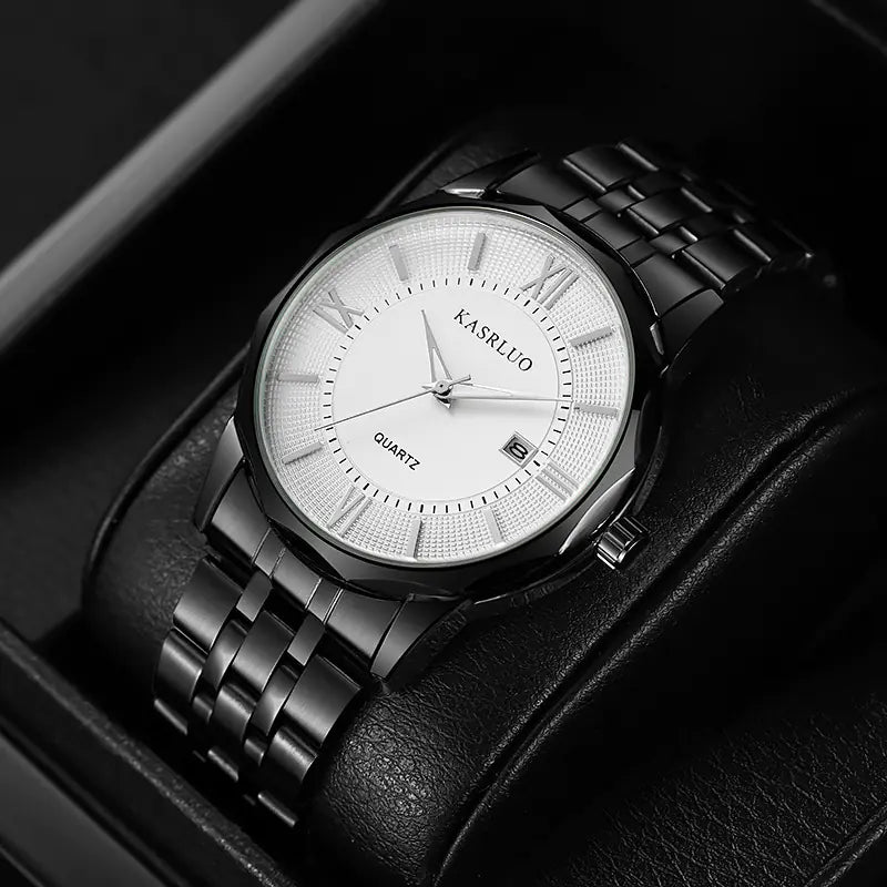 Black wristwatch with white face on a black leather strap, displayed in a box.