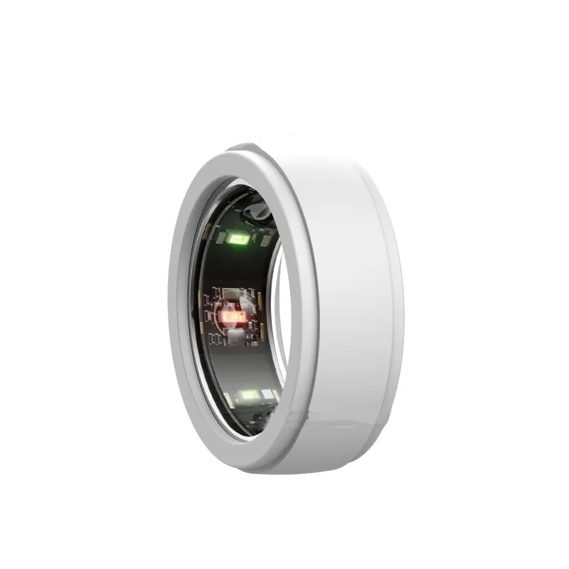 Close-up of a white electronic device with a circular design on a white background